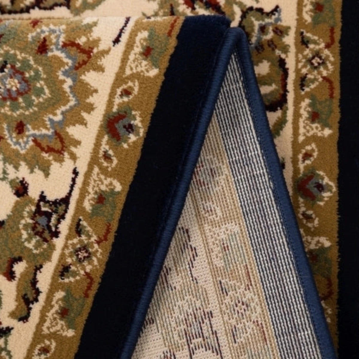 Elegant navy rug with detailed classic design.