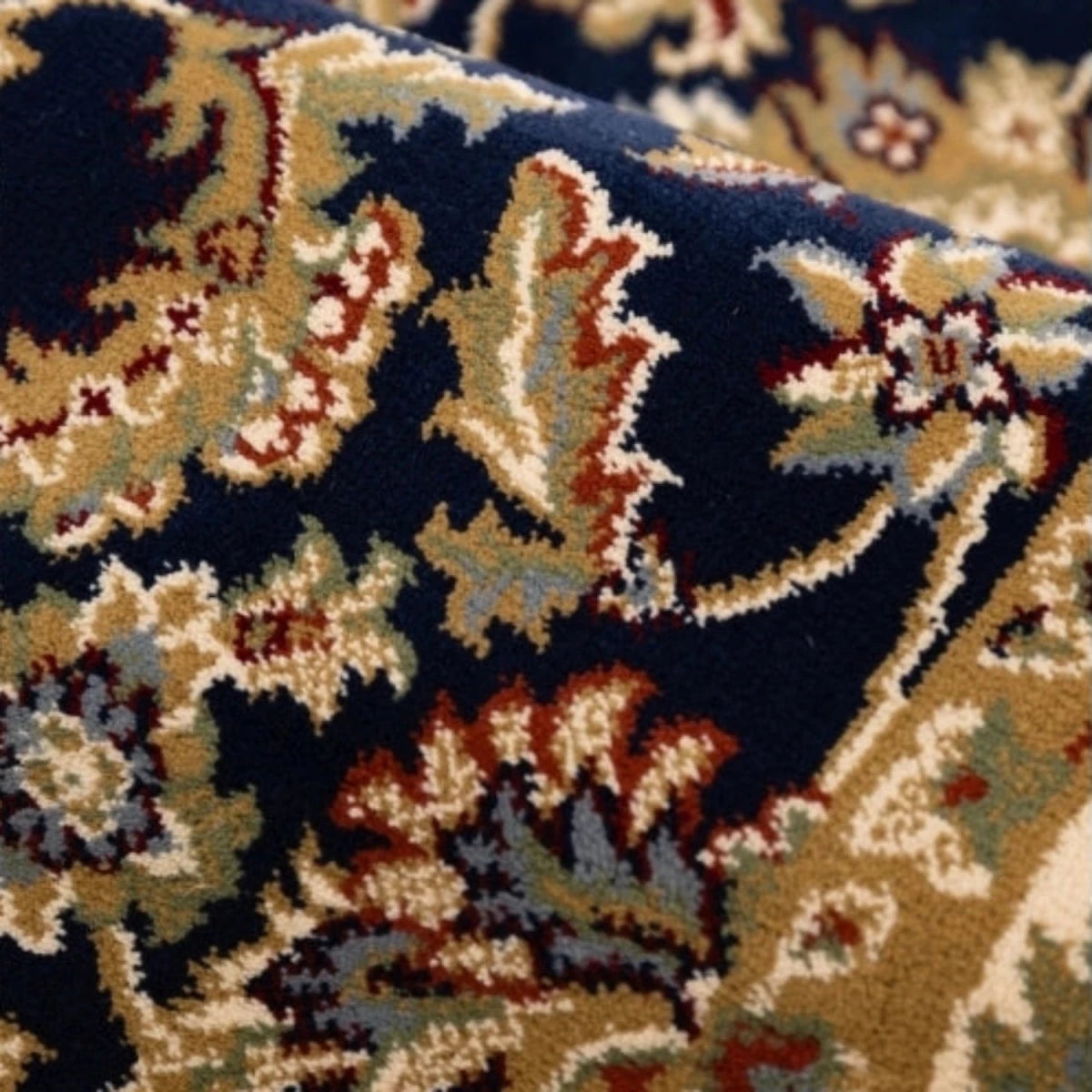 Traditional patterned runner rug in deep navy tones.