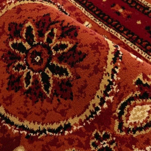 Rustic rug with detailed tribal motifs.