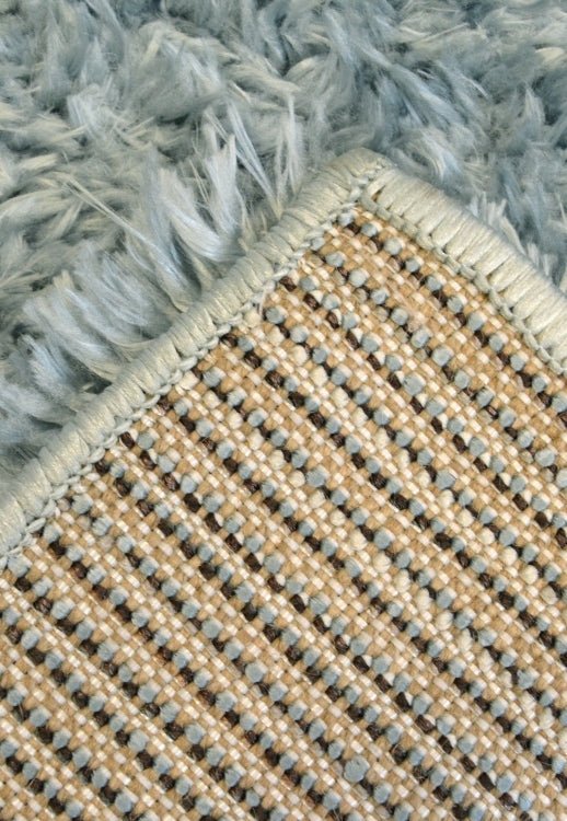 Soft area rug with refreshing colour and luxurious feel.