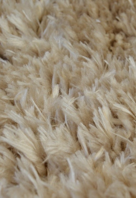 Plush neutral rug designed for comfort and simplicity.