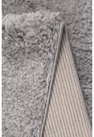 Plush silver rug designed for comfort and sophistication.