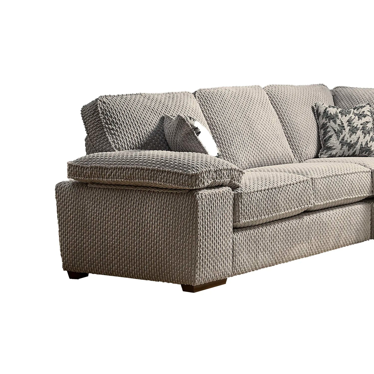 Gray sofa with textured pattern on a white background