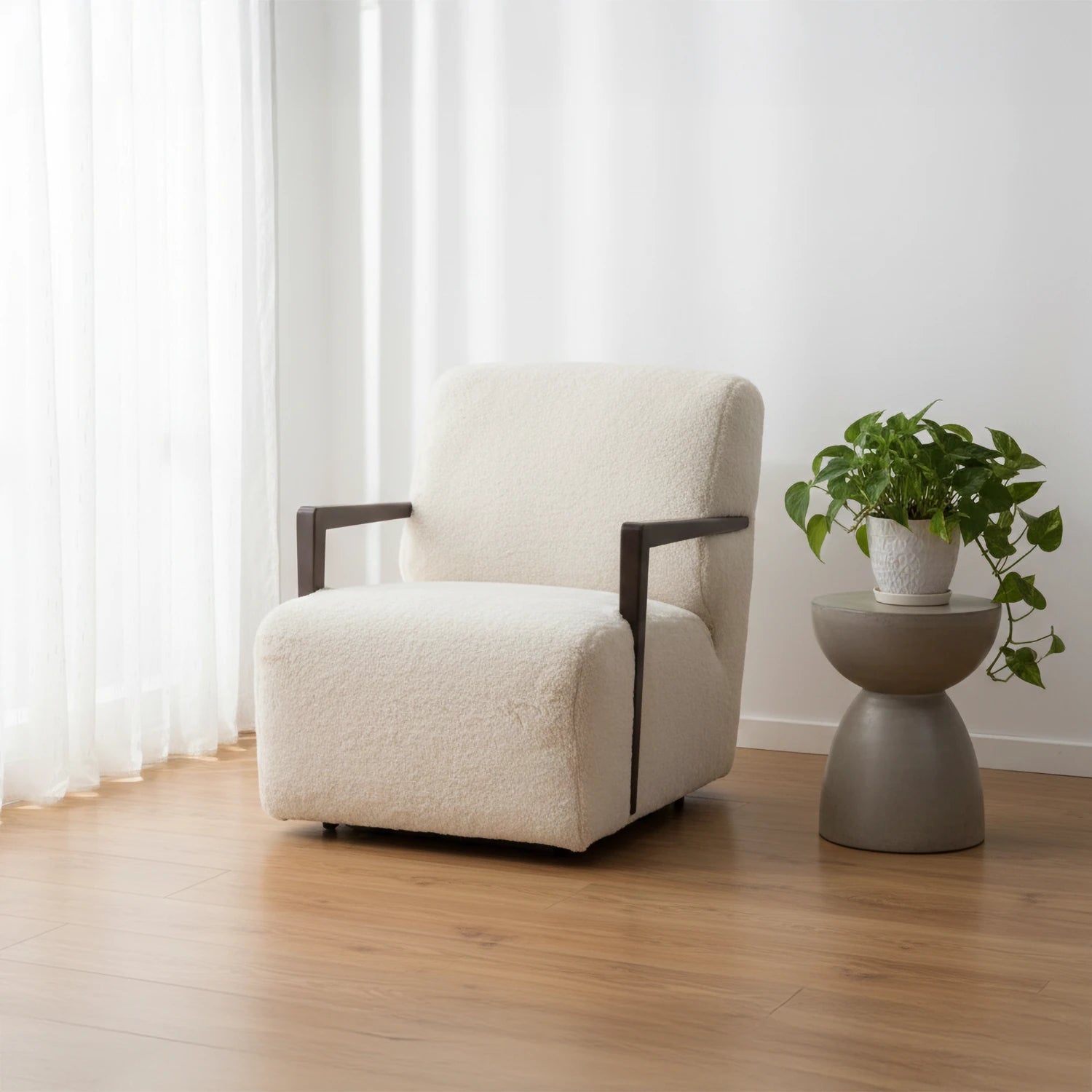 Shop the aura Chair in soft Bear fabric with Mid or Walnut Oak arms.