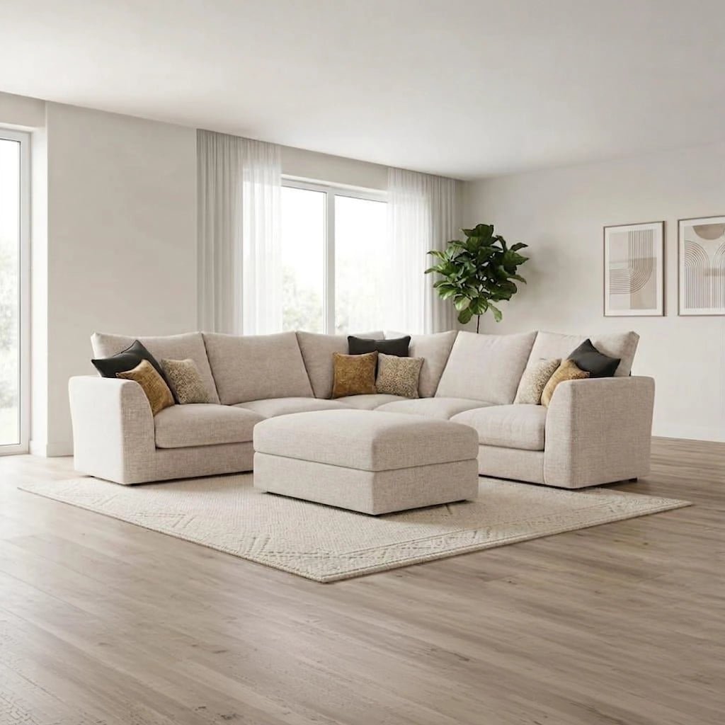 Modern modular fabric sofa with deep cushions, neutral upholstery, and a coordinating stool for added comfort
