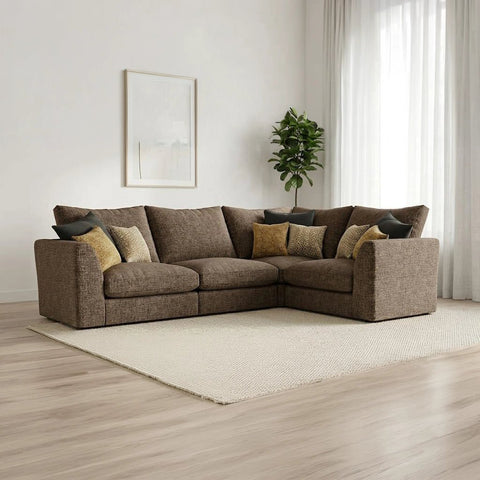 Modern modular fabric sofa with deep plush cushions and neutral textured upholstery