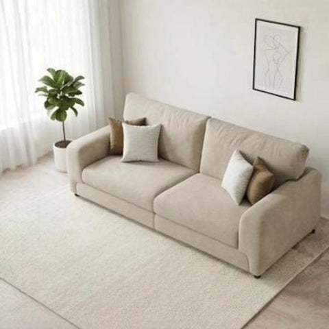 Large 4 seater fabric sofa with deep seating and cushions UK.