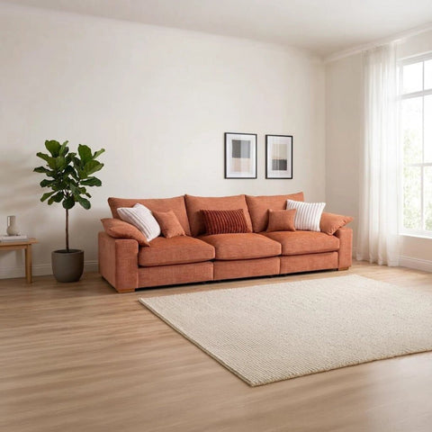 Lennox Steppe 4 seater fabric sofa with deep feather-filled cushions, soft chenille upholstery, and a modern modular design.