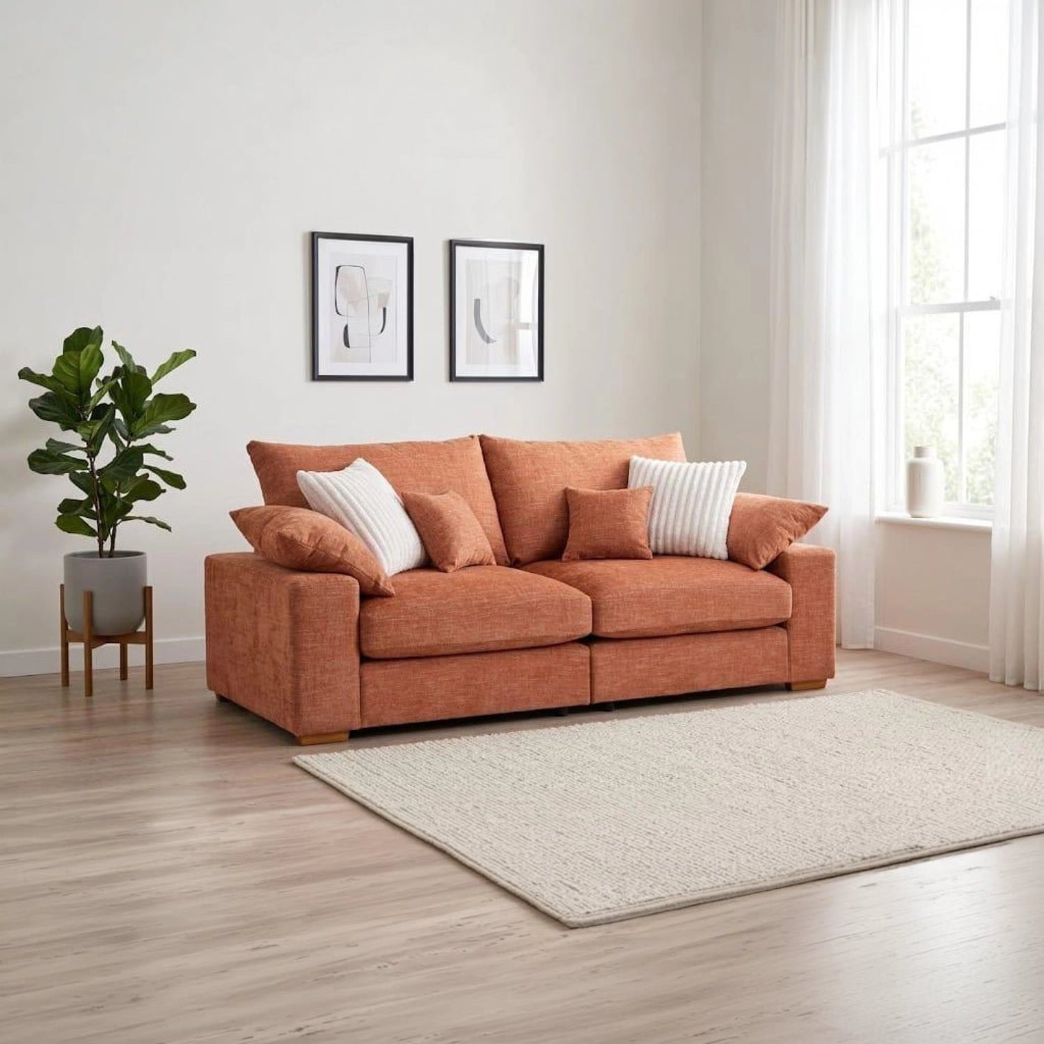 Lennox Steppe 3 seater fabric sofa with deep plush seating, feather-filled cushions, and soft chenille upholstery.