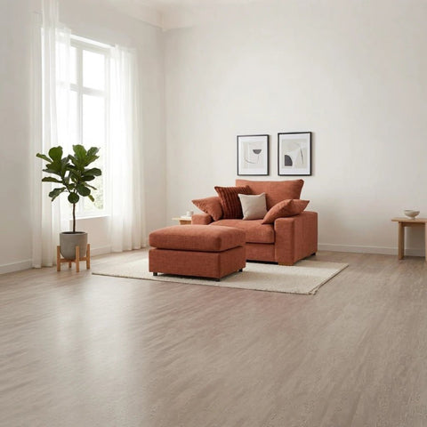 Lennox Steppe fabric chair with deep cushioned seating, feather-filled comfort, and soft chenille upholstery and stool.