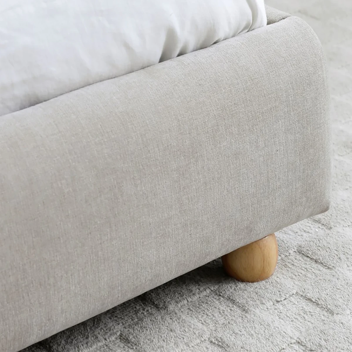 Close up of wooden feet on the Lilo Chenille King Size Bed with Curved Headboard - Bed In A Box