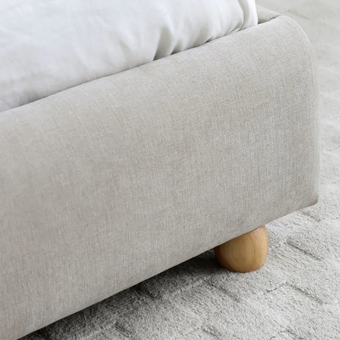 Close up of wooden feet on the Lilo Chenille King Size Bed with Curved Headboard - Bed In A Box