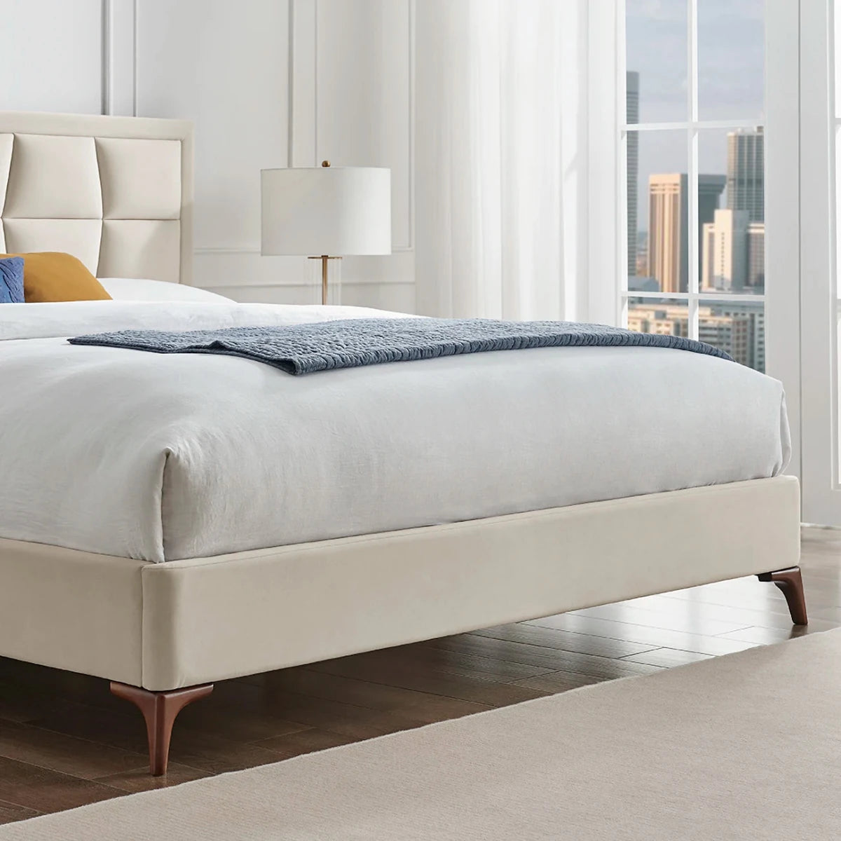 Close up of Bronze metal feet on the Camila Luxury Velvet Bed