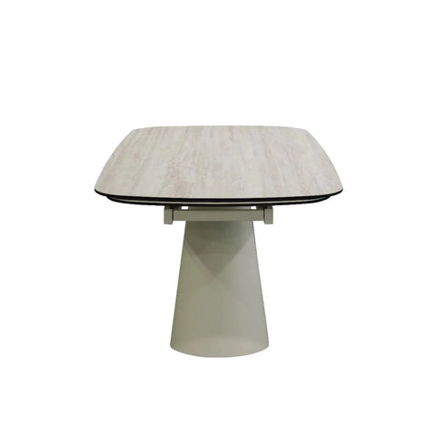 Side view of Contemporary dining table with sculptural pedestal base