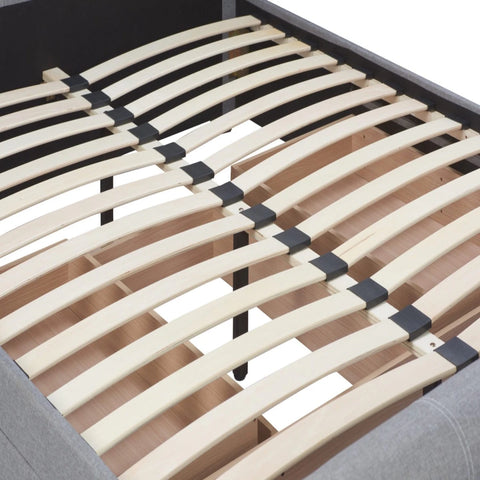 Rear view of sleigh bed showing curved headboard support structure.