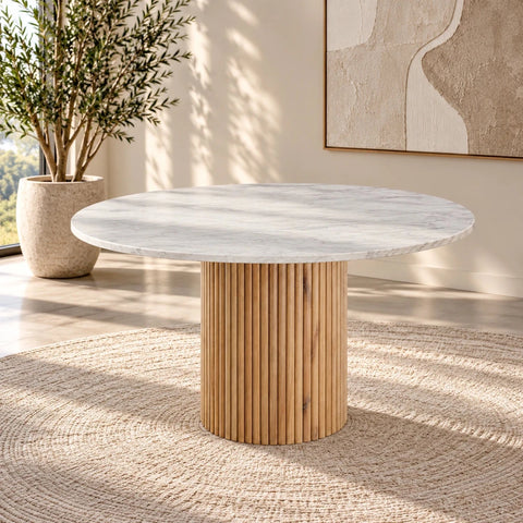 Shop the Lusso 120cm Round White Marble Dining Table with a fluted mango wood pedestal base. Genuine natural marble, unique veining and seating for four.