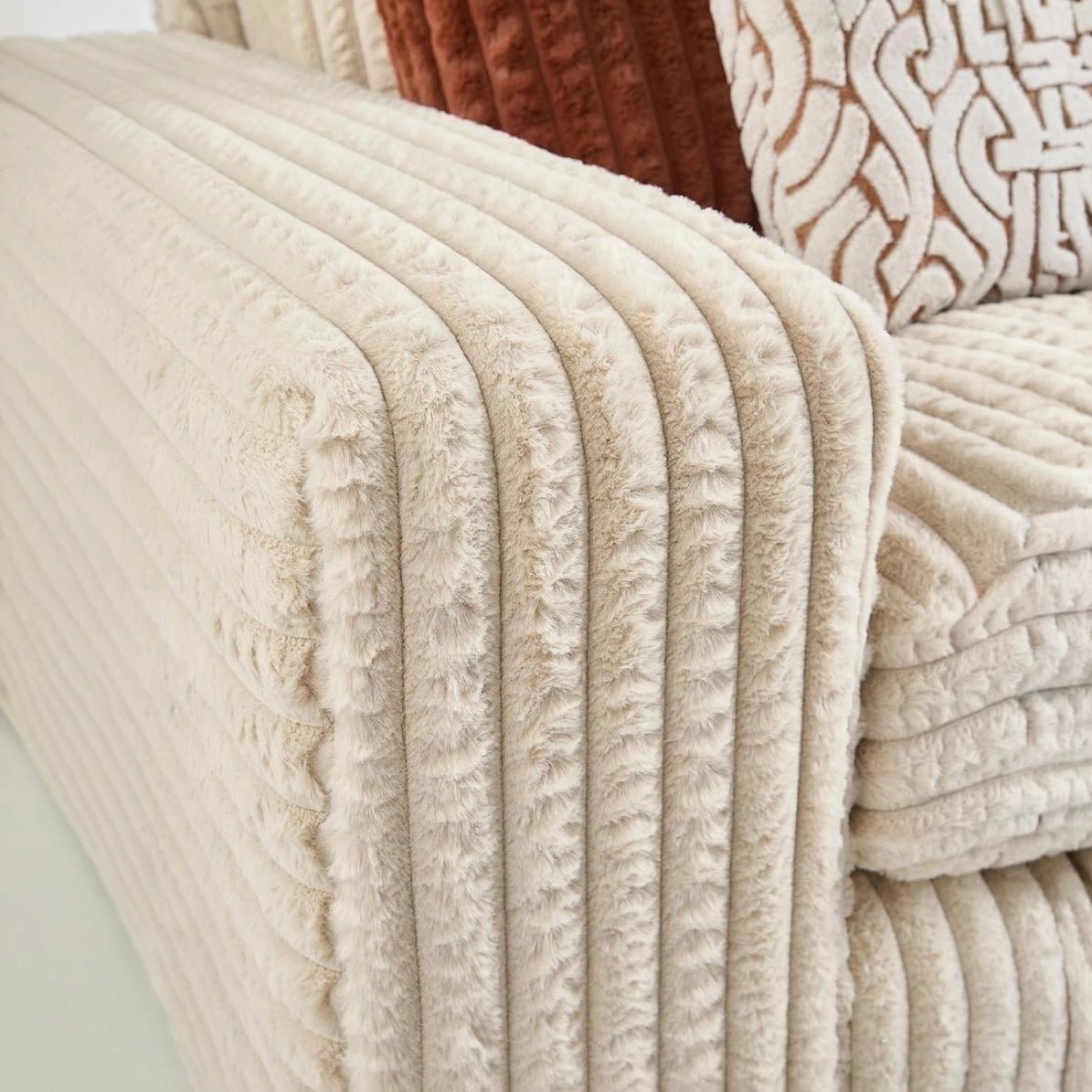 Premium high-pile cord fabric for modern sofa design.