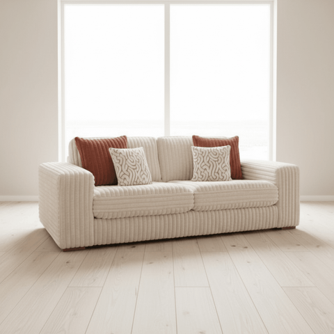 Luton Versailles 3 seater sofa with cord fabric, wooden feet, and patterned cushions.