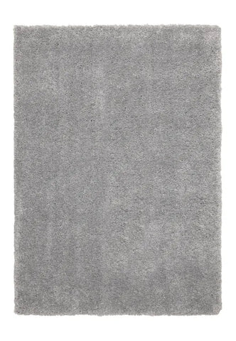 Grey rug texture detail with thick plush strands.