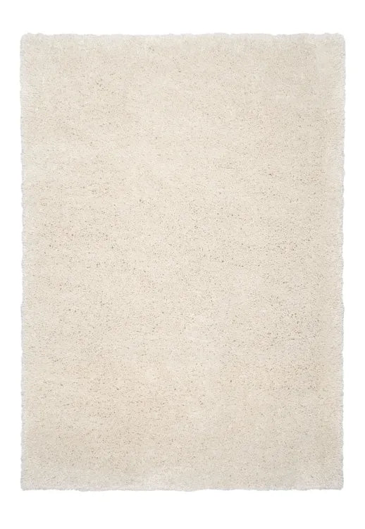 Soft ivory shag rug with thick texture and stylish look.