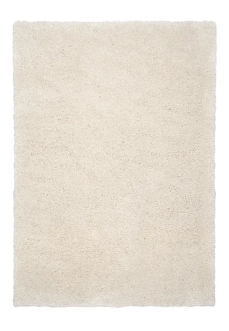 Soft ivory shag rug with thick texture and stylish look.