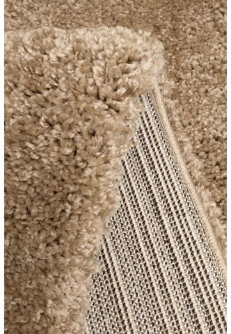 Close-up of soft shaggy fibers with dense natural texture.