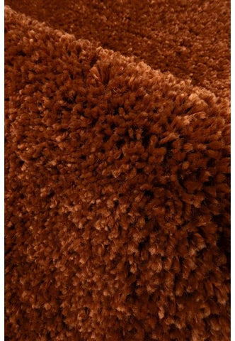 Terra rug texture detail with thick plush strands.
