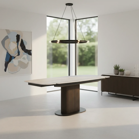 Umbria ivory grey travertine ceramic extending dining table with wooden pedestal and black metal base. Heat and scratch resistant, extends to 220cm.
