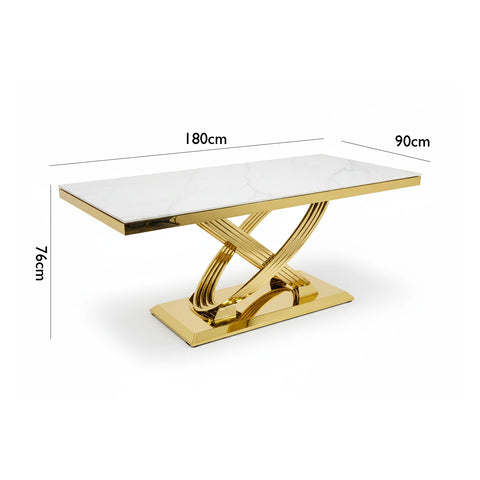 Dining table with gold base and cream marble top, shown with dimensions on a white background.