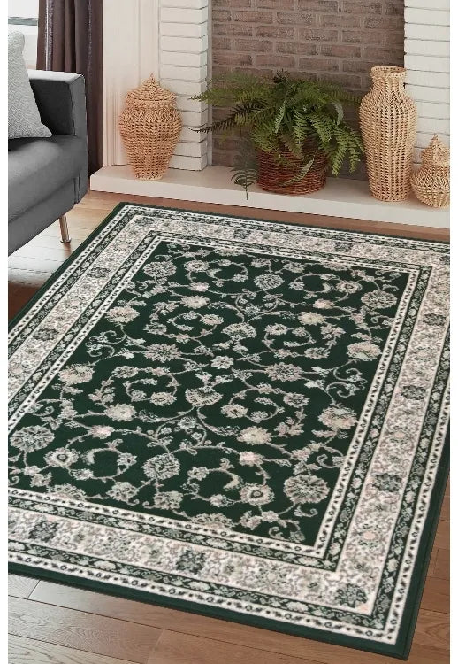 Agrah green rug with classic traditional pattern design.