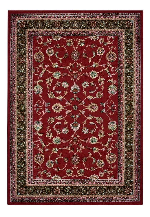 Red rug with elegant decorative detailing.