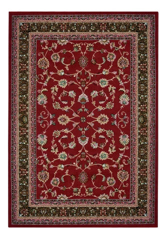 Red rug with elegant decorative detailing.