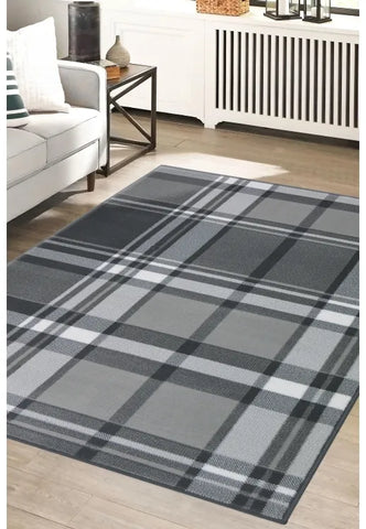 Grey rug with timeless design and subtle pattern.