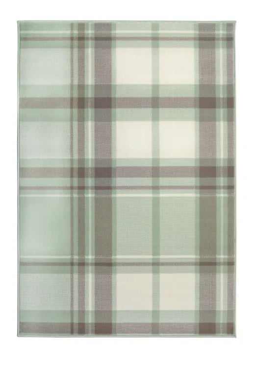 Neutral green rug creating a calm and elegant look.