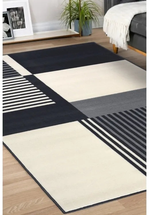 Contemporary rug with soft grey tones and linear pattern.