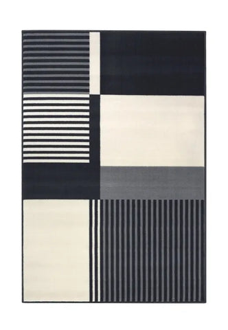 Modern patterned rug adding elegance and texture.