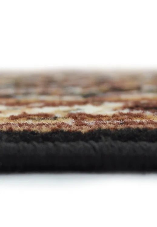 Decorative black rug with classic patterned design.