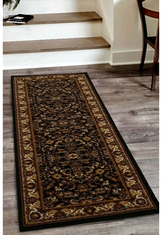 Black runner rug with traditional Beluchi pattern design.