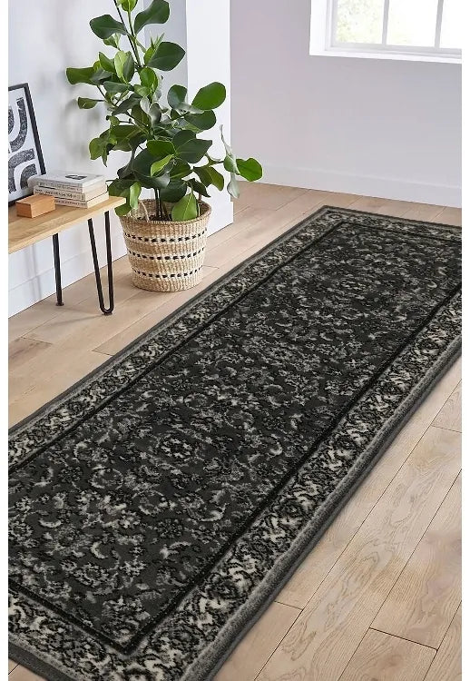 Dark grey runner with intricate traditional Beluchi pattern design.