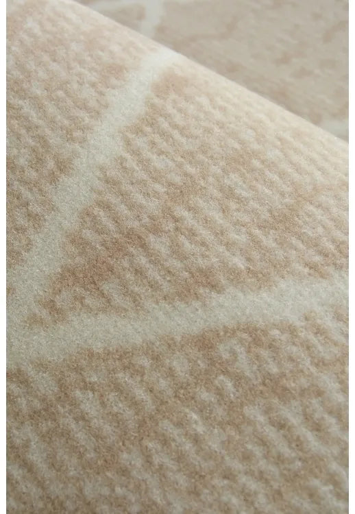 Machine woven rug designed for easy maintenance.