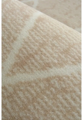 Machine woven rug designed for easy maintenance.