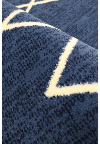 Denim rug with elegant Berber inspired design.