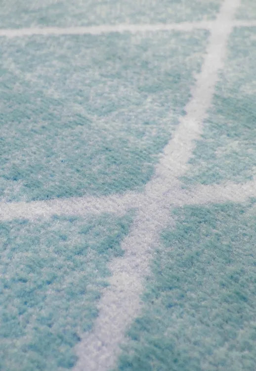 Polypropylene rug with soft pile and durable construction.