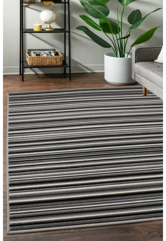 Grey rug with subtle fine stripe pattern design.