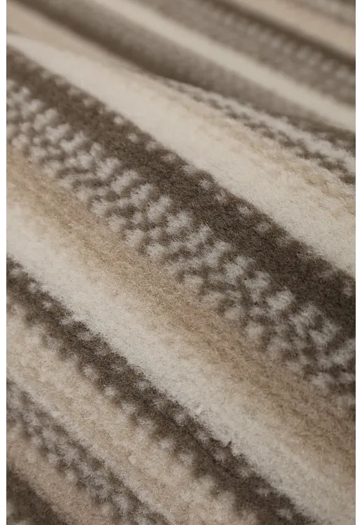 Polypropylene rug with soft pile and durable construction.