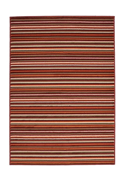 Modern red rug adding warmth and texture to interiors.
