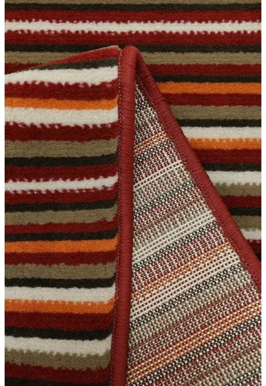 Polypropylene rug with soft pile and durable construction.