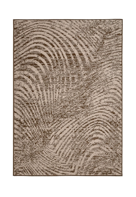 Abstract swirl rug adding depth and movement.