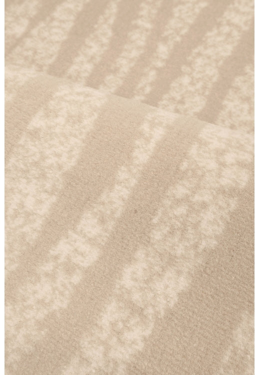 Polypropylene rug with soft pile and durable construction.
