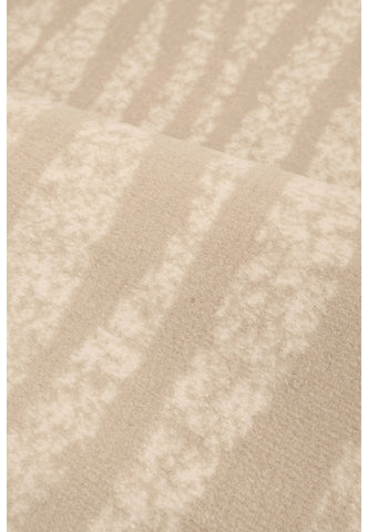 Polypropylene rug with soft pile and durable construction.